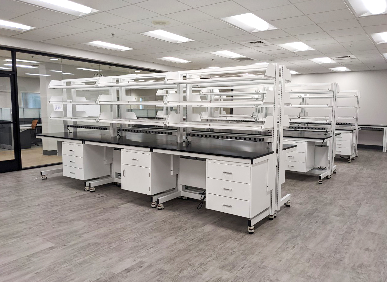 Carts with suspended cabinet and upper shelving, in a lab
